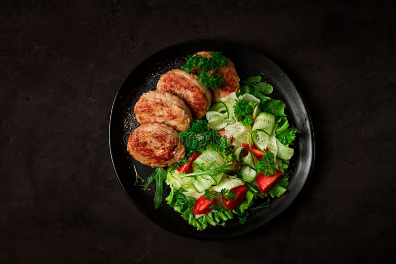 Fried Cutlets, Turkey, with Vegetable Salad, Top View, No People, Stock