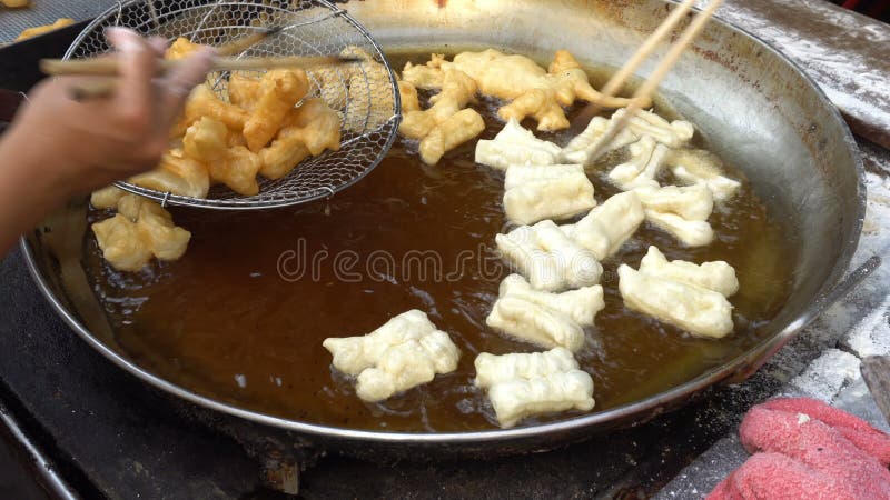 Fried Deep fried dough stick at street food breakfast is famous for backpacker and local and tourist at Chiang Mai Thailand.