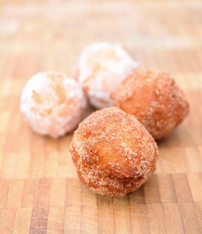 Fried donuts on a wooden plate. royalty free stock photo Fried donuts on a wooden plate. royalty free stock photo