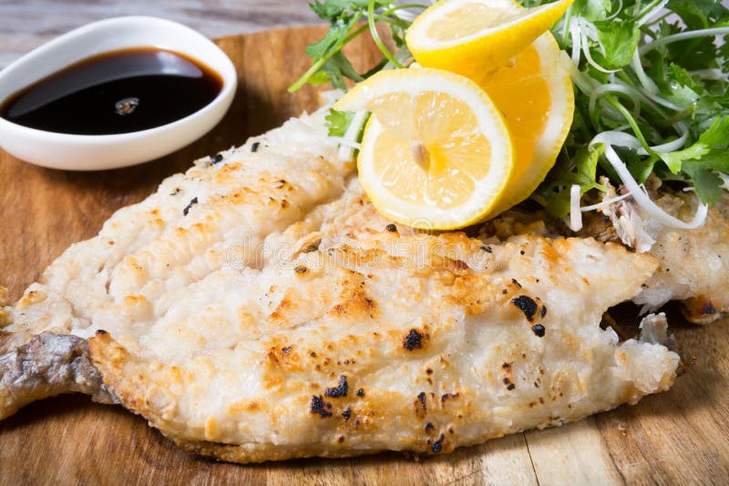 Fried dorado fish stock photo. Image of herbs, delicious 75177564