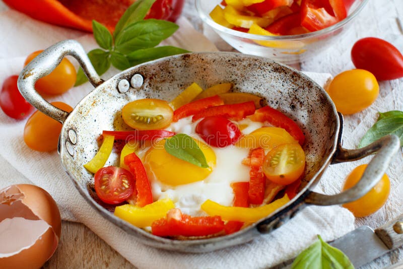 Fried Egg with a Bell Pepper and Tomatoes Stock Photo Image of close
