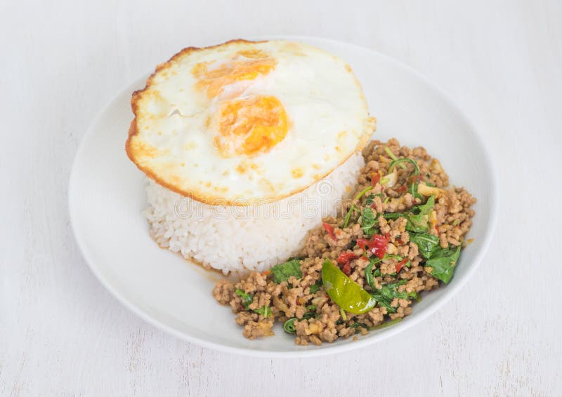 Fried Egg and Fried Pork with Basil Leaves Stock Photo Image of rice