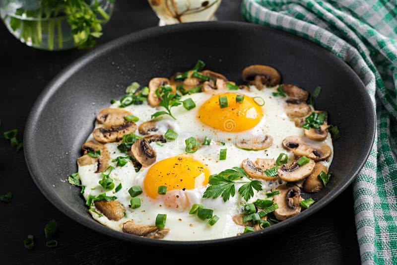 Fried Egg, Mushrooms and Spinach. Stock Image - Image of diet