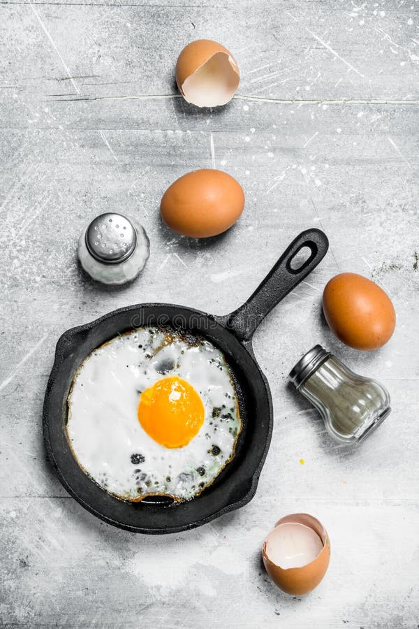Fried Egg with Salt and Black Pepper Stock Photo Image of cooking