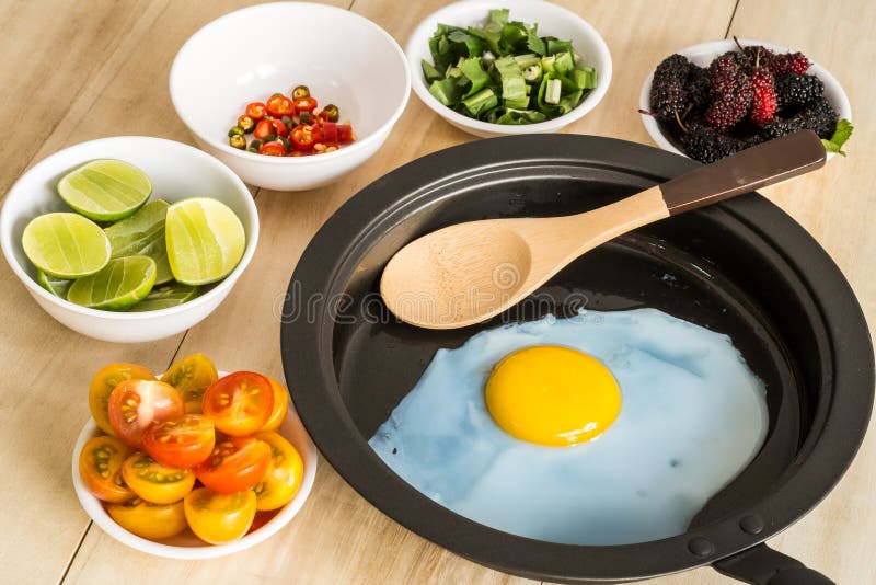 Fried egg and side dishes stock photo. Image of diet 55294024