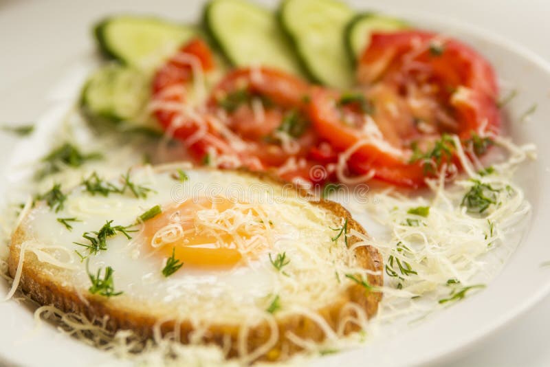 Fried egg and vegetables for breakfast