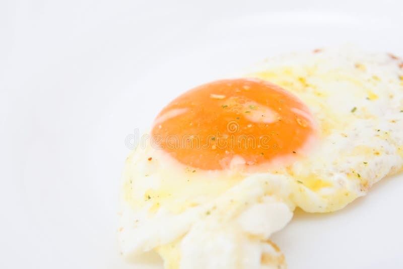 Fried egg yolk stock image. Image of food, close, cholesterol 15098523