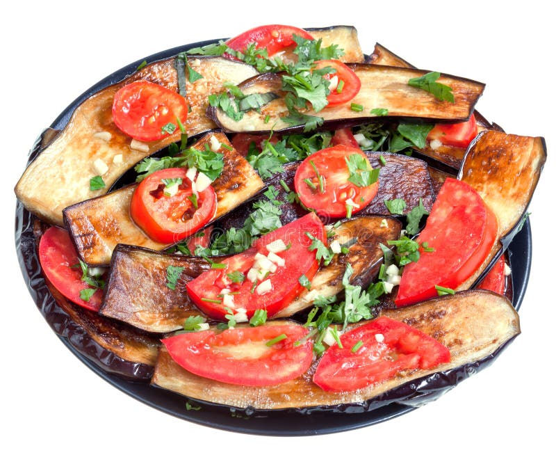 Fried eggplants with red tomato and garlic