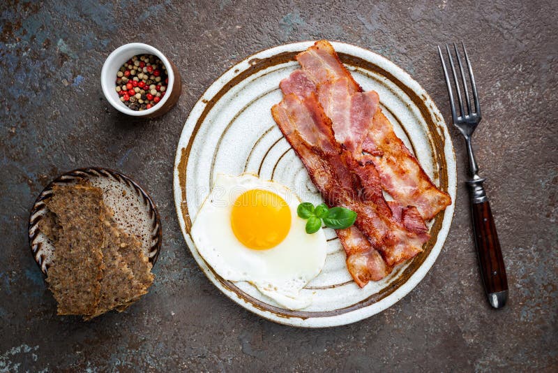 Fried eggs and bacon stock photo. Image of meat, healthy 192599666