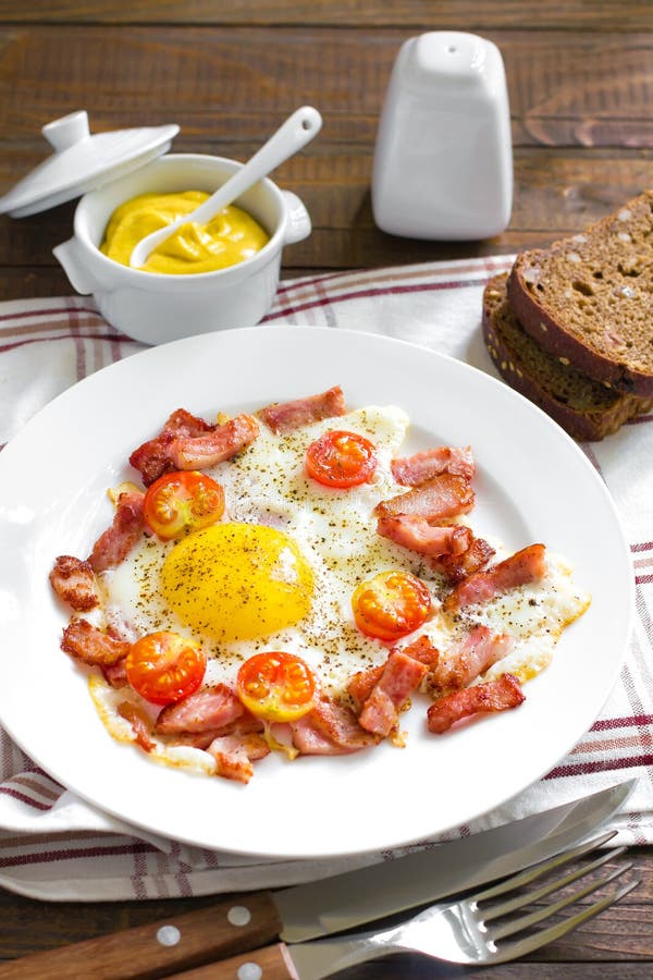 Fried eggs with bacon stock photo. Image of lard, fried - 33596372