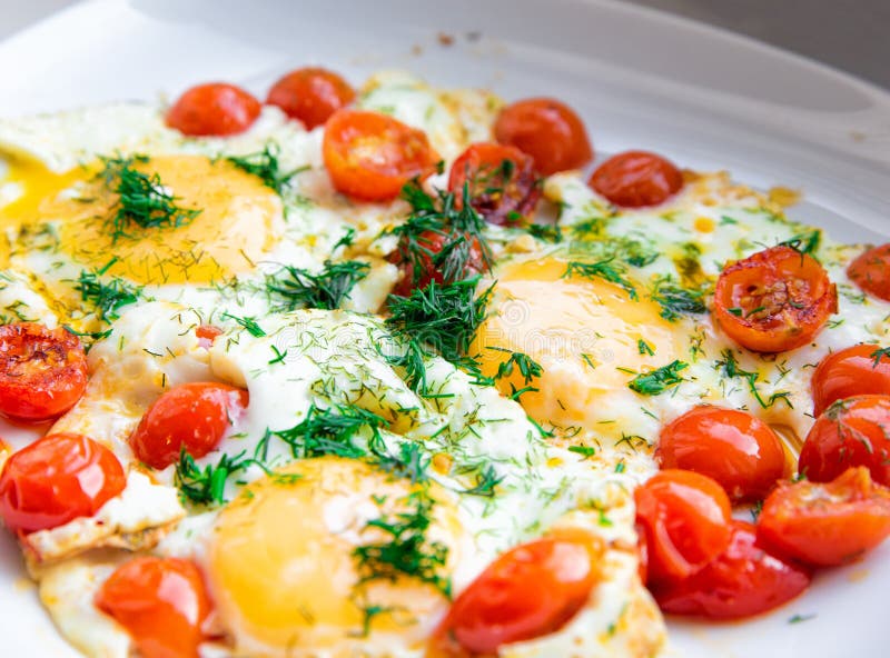 Scrambled Eggs With Roasted Cherry Tomatoes Stock Image Image of delicious, white 40193353