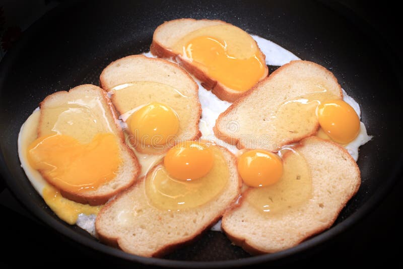 Fried eggs and fried bread stock photo. Image of cuisine 45189294