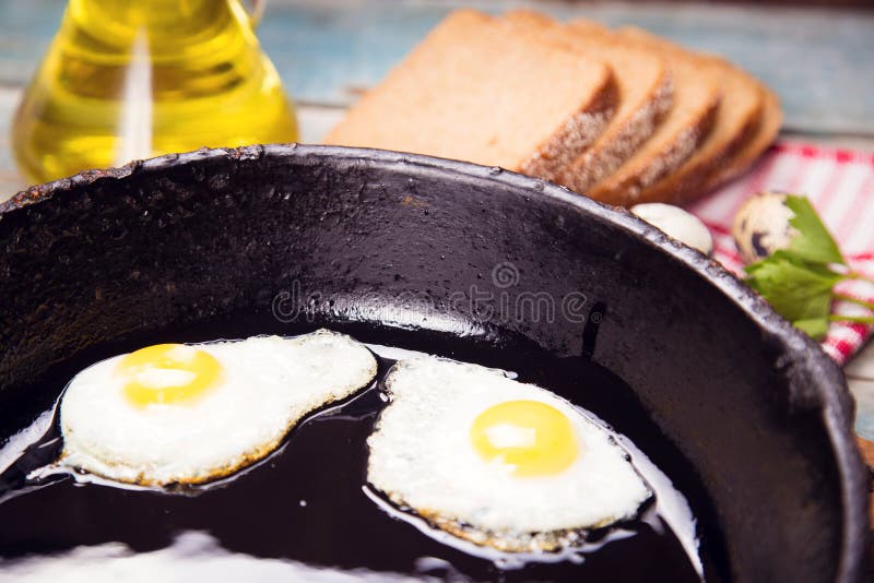 Fried Eggs on a Frying Pan with Oil Stock Image Image of cooking