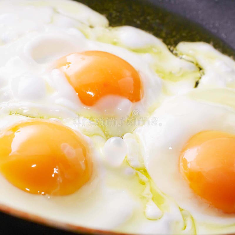3 Fried Eggs in a Frying Pan Stock Image Image of lunch, gray 176638153