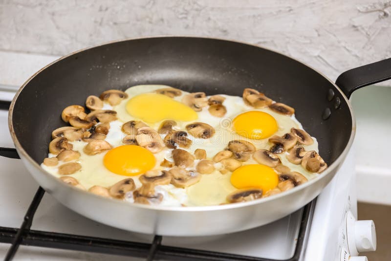 Fried Eggs with Mushrooms for a Breakfast Stock Image - Image of eggs