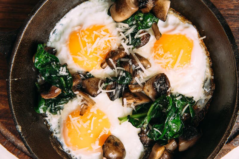 Fried Eggs with Mushrooms and Spinach in Pan Stock Photo Image of