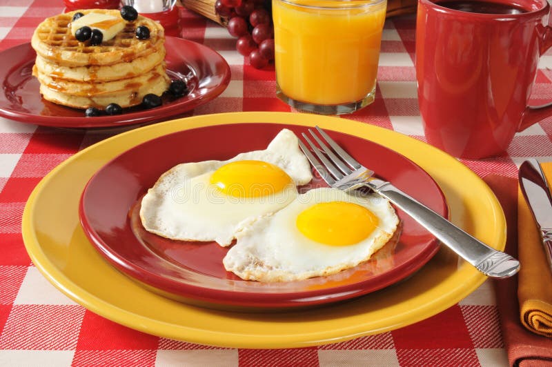 Fried eggs and pancakes stock image. Image of eggs, buttermilk 32405099