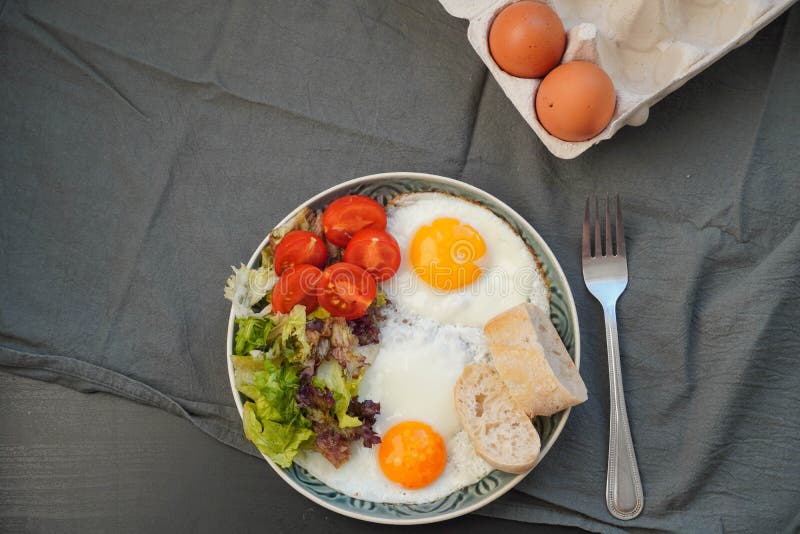 Fried eggs for breakfast stock image. Image of fried 240046079