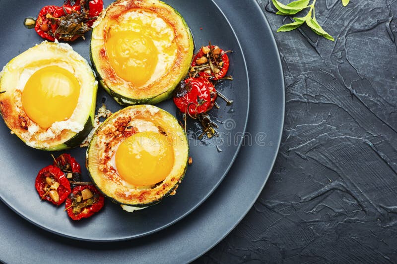 Fried eggs in zucchini stock image. Image of scrambled 189300783