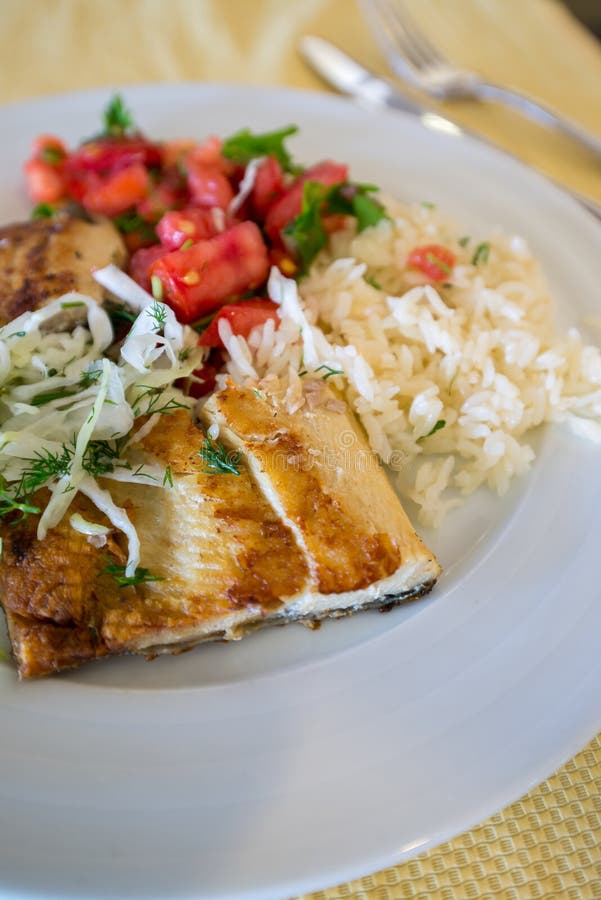 Fried Fish with Rice Cabbage and Tomatoes on Plate Stock Photo Image