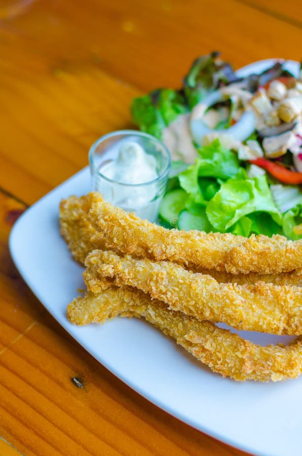 Fried fish with salad. stock photo. Image of dinner, appetizing - 34335204