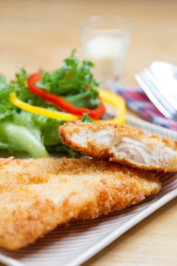 Fried fish and salad