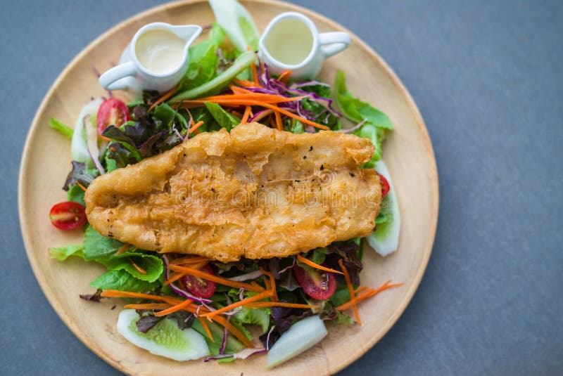 Fried fish salad stock image. Image of grill, healthy 93420589
