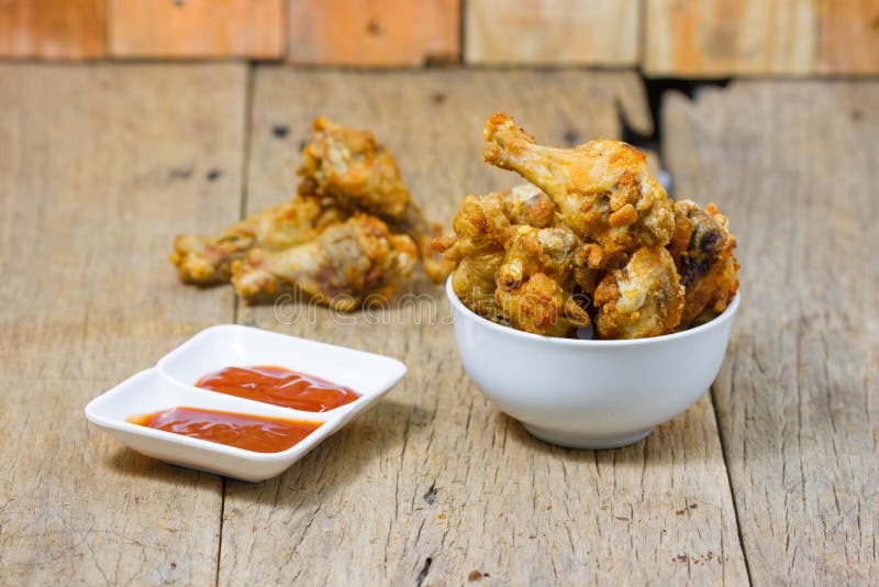 Fried Fish Sauce Marinated Chicken Drumstick and Sauce Stock Photo