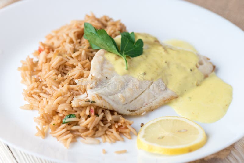 Grilled Fish with Rice and Lemon Sauce Stock Image Image of fish