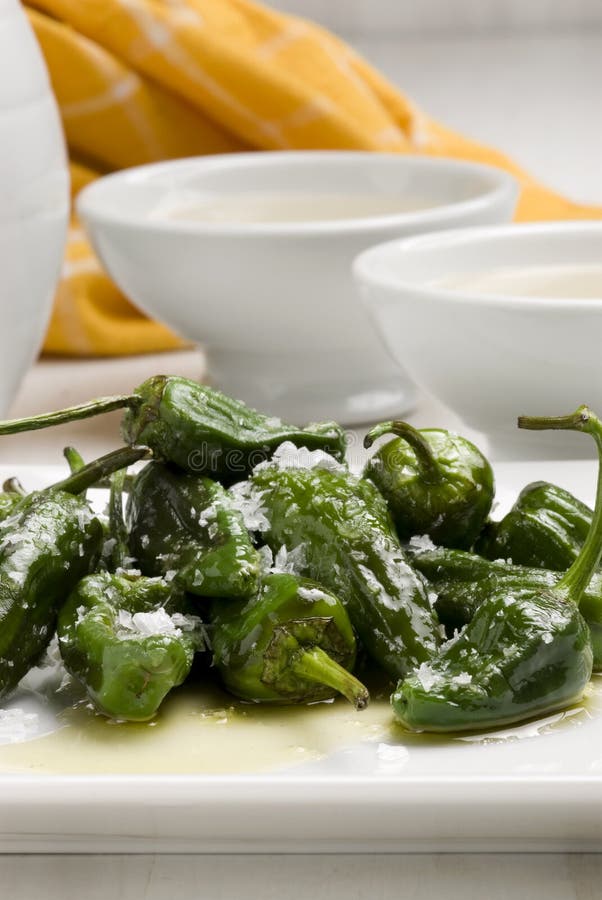 Fried green peppers. stock photo. Image of cuisine, spanish 12333316