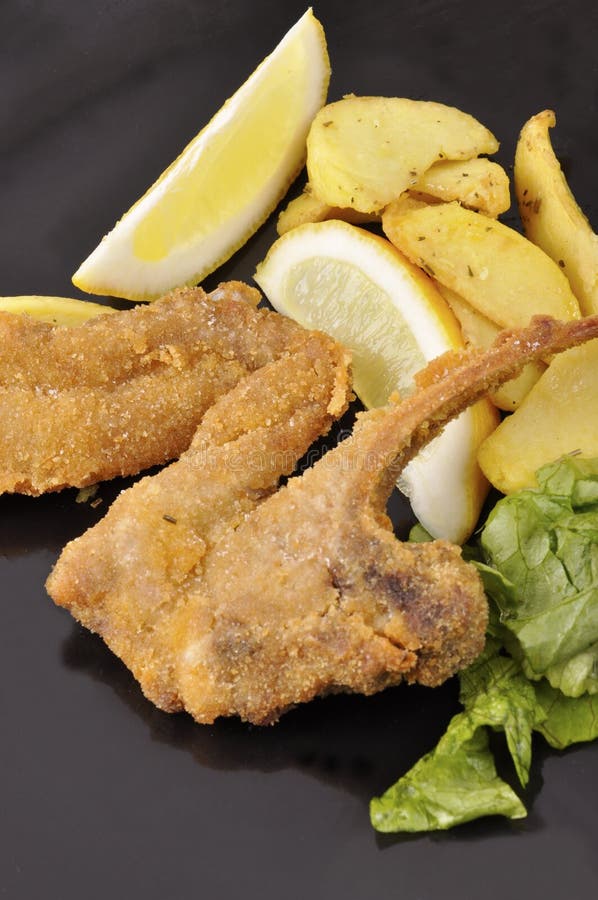 Fried lamb cutlets stock image. Image of potatoes, insakata 24575489