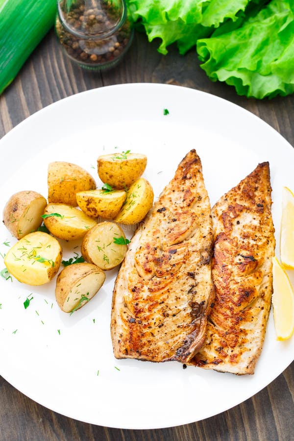 Fried Mackerel with Baked Potato Stock Photo Image of white