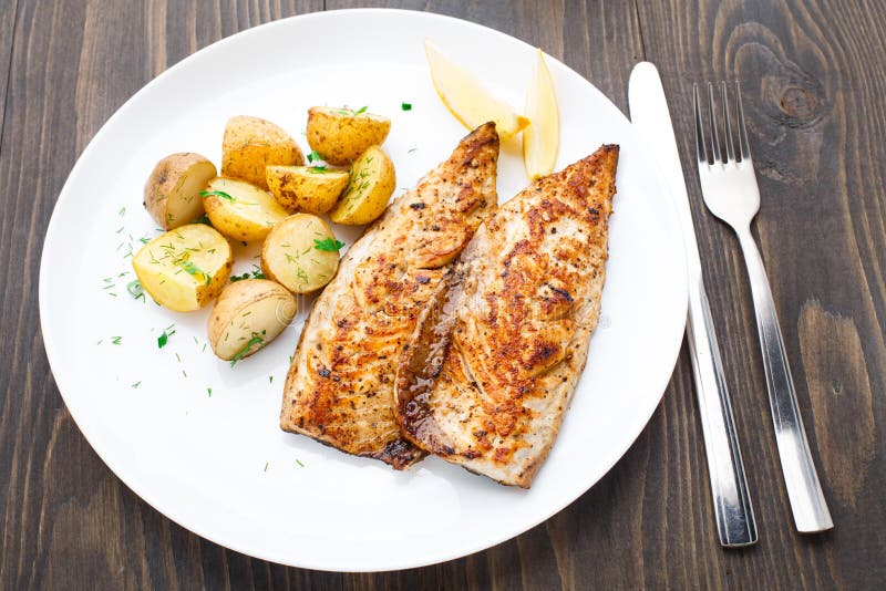 Fried Mackerel with Baked Potato Stock Image Image of crispy, parsley