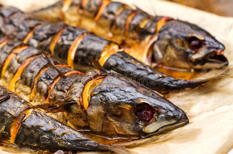 Fried mackerel with lemon royalty free stock photography