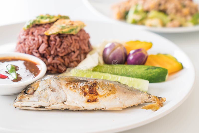 Fried Mackerel with Shrimp Paste Sauce and Berry Rice Stock Image