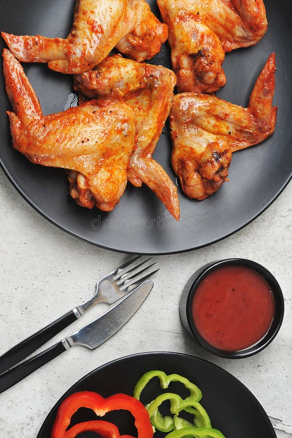 Fried Marinated Chicken Wings on a Black Plate Stock Photo Image of