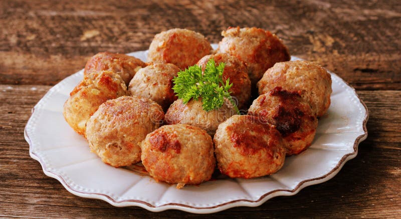 Fried meat ball, delicious meat cutlets on rustic dark table