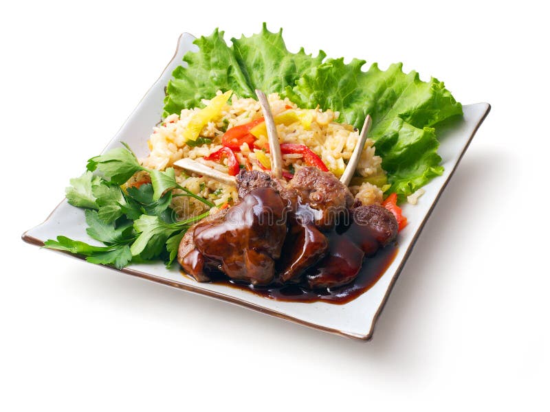 Fried meat ribs in sauce with rice salad...