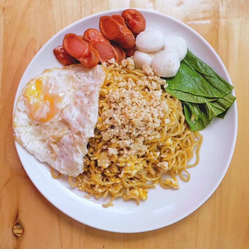 Fried Noodles with Sausage Egg and Meatball Topping Stock Image Image