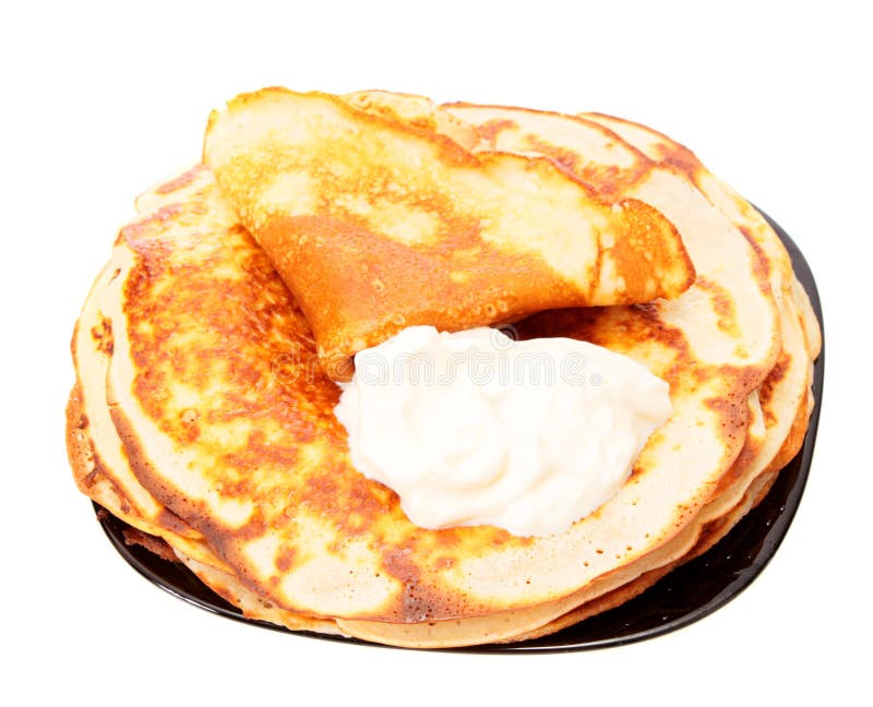 Fried pancakes on a plate, isolated.