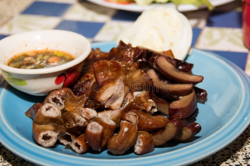 Fried pork intestines stock photo. Image of onion, head 43974300