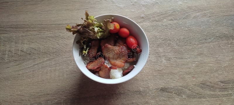 Fried Pork Over Rice in a White Bowl Stock Image - Image of ingredient