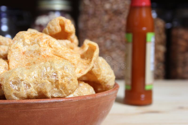 Fried Pork Skins with Hot Sauce in Rustic Kitchen Stock Image Image