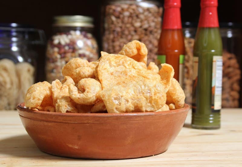 Fried Pork Skins with Hot Sauce in Rustic Kitchen Stock Image Image