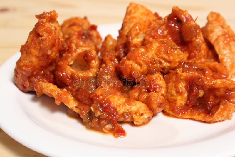 Fried Pork Skins with Red Salsa in Rustic Kitchen Stock Photo Image
