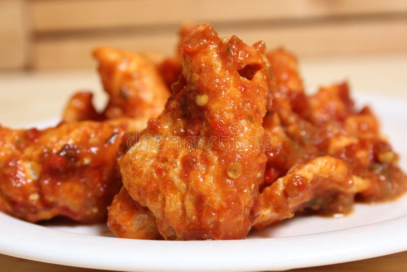 Fried Pork Skins with Red Salsa in Rustic Kitchen Stock Photo Image