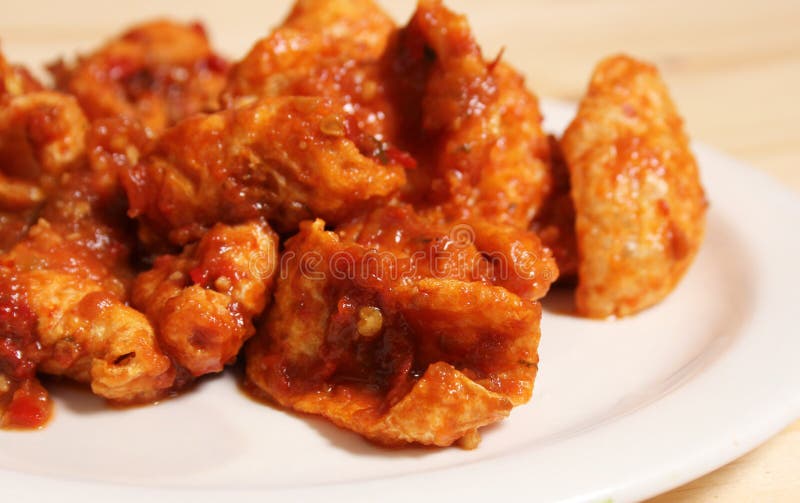 Fried Pork Skins with Red Salsa in Rustic Kitchen Stock Photo Image