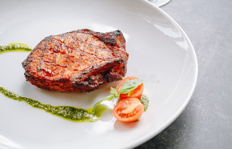 Fried Pork Steak in Spices and Olive Oil and Basil Dressing Stock Image Image of juicy, fillet