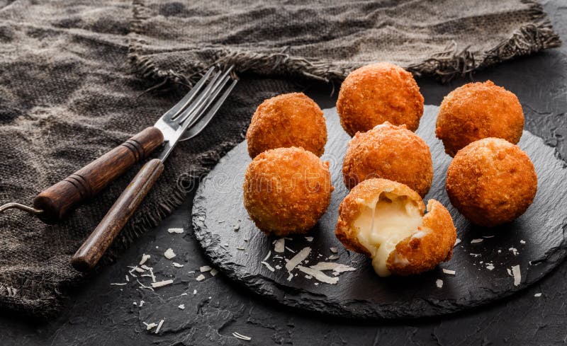 Two Potato Balls Are Partially Eaten With Cheese In The Middle Background,  Croquette On White Background, Hd Photography Photo Background Image And  Wallpaper for Free Download