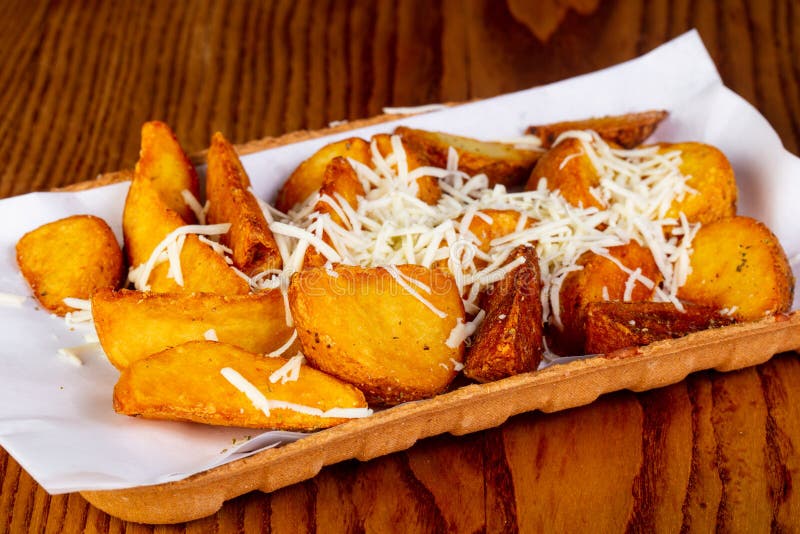 Fried potato with cheese stock photo. Image of meal 121893170